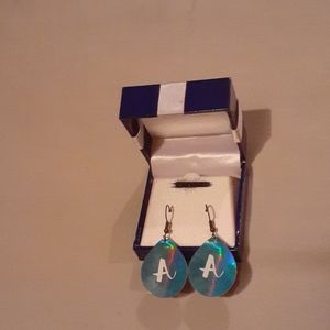 Teal hand crafted dangling earrings